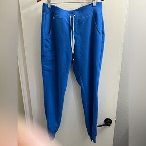 Figs Blue Track Pants with Tapered Fit and Drawstring Waist..small bleach stain